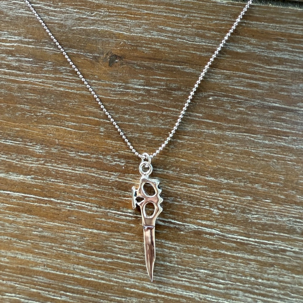 Elegant Silver Dagger Pendant Necklace